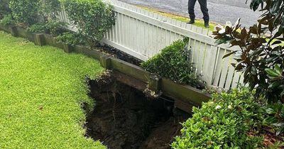 Sinkhole opens up in front yard after rain cell dumps almost 200mm in parts of the Hunter