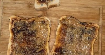 Man sparks debate by cutting 'mouldy spots' off bread before eating it