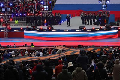 Putin hails Russia's fighters in Ukraine at rally in Moscow