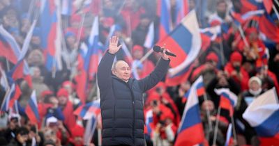 Vladimir Putin fills stadium with 'loyalists' who had been bribed with day off work