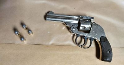 Gardai on patrol on busy Dublin street seize gun and arrest two men