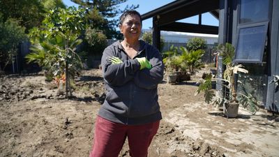 'We had to dig our way in': In NZ, the water has receded, but the mud has stayed