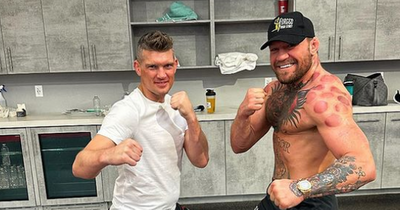 Conor McGregor poses with Wonderboy Thompson and everyone says the same thing