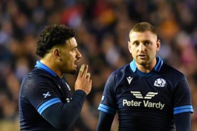Scotland's Tuipulotu bonds with Russell on the naughty step