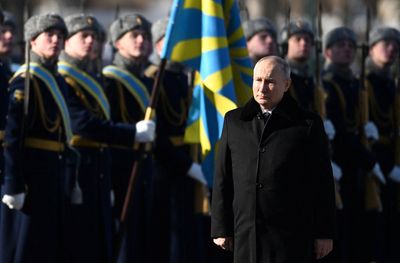 Ukraine defends front, Putin talks up nuclear arsenal on war anniversary eve