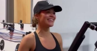 Rita Ora shows off her enviable toned abs with sweaty gym workout