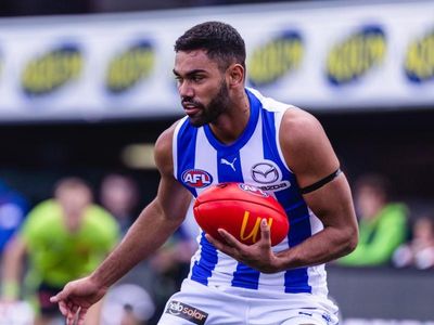 North Melbourne player in court over order breaches