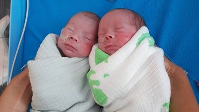 Twin boys reunited with police, health care workers after emergency birth in north-west NSW