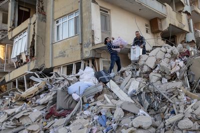 Turkey steps up rebuilding plans as quake toll nears 50,000
