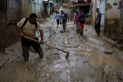 Brazil downpours leave at least 50 dead as rescue ship arrives