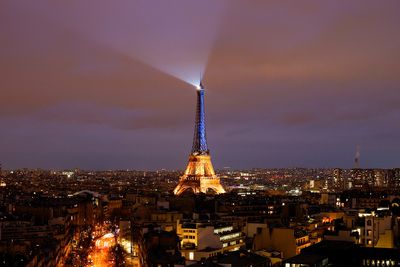 Paris lights up Eiffel Tower in colours of Ukraine flag