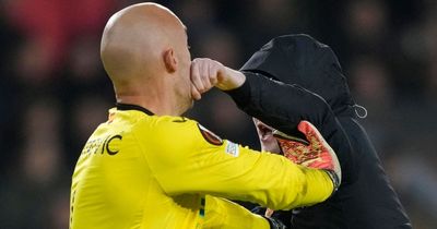 Sevilla keeper fights pitch invader and pins him to the ground until police arrive
