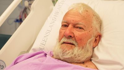 Qld farmer John Lawson's remarkable tale of survival after being buried up to his neck in grain silo