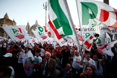 Beaten and divided, Italy's centre-left seeks new leader