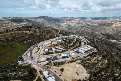 Israeli West Bank settlers 'sing and dance' after outpost recognised