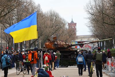 Vigils and a wrecked tank as Ukraine's allies mark year of war