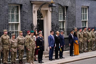 UK falls silent on anniversary of Russian invasion as Sunak praises Ukrainian bravery