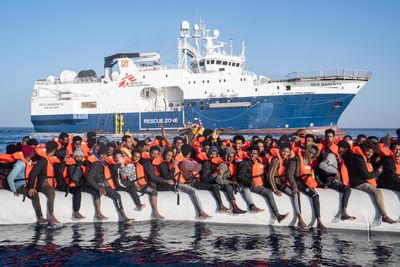 Italy detains migrant rescue ship, fines charity