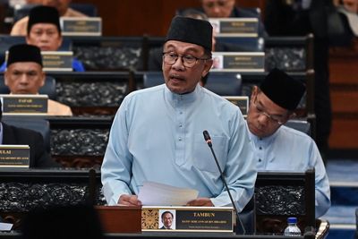 Malaysia helps poor, raises taxes for rich in 2023 budget