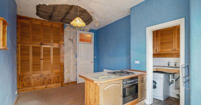 Glasgow ‘fixer-upper’ flat with hole in ceiling and wacky bathroom hits the market