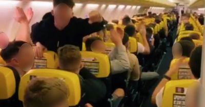 Drunk Man Utd fans on Ryanair flight sing obscene chants directed at air hostess