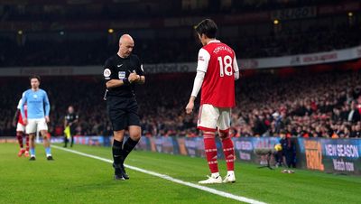 Arsenal and Man City fined for surrounding referee Anthony Taylor