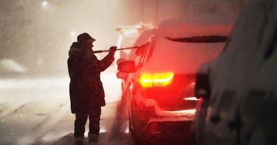 California battered by blizzards and gale-force winds with people stuck in cars on roads