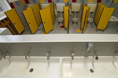 Tables flipped as students protest over new toilet rules at academy school