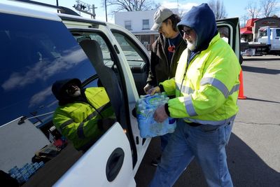 After Ohio train wreck, Biden orders door-to-door checks