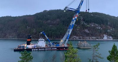 Serene Highland bay 'left a death zone by sunken fish farm barge'