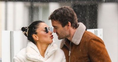 Nicole Scherzinger squashes split rumours with Thom Evans as they pucker up in LA