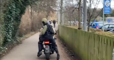 Terrifying moment trio of hooded youths on motorbike spotted in Tesco car park