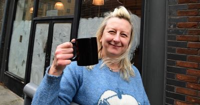 Café where customers are invited to 'pay it forward' marks milestone