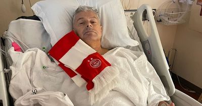 Dave Cormack sends Aberdeen fans update from hospital bed as dedicated chairman poses with scarf