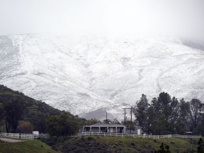 Snow blankets Los Angeles area in rare heavy storm