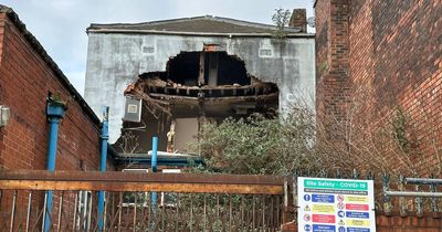 Drones search site of derelict building after collapse