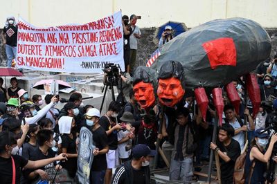 Marcos seeks unity as Philippines marks 'people power' anniversary