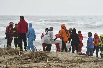 Dozens killed as boat carrying refugees sinks off Italy
