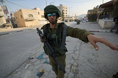 Two Israelis killed in West Bank amid Jordan talks