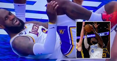 Los Angeles Lakers suffer nightmare injury scare as LeBron James 'hears pop' and goes down