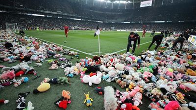 Turkish football fans shower pitch with toys for children affected by Türkiye-Syria earthquake