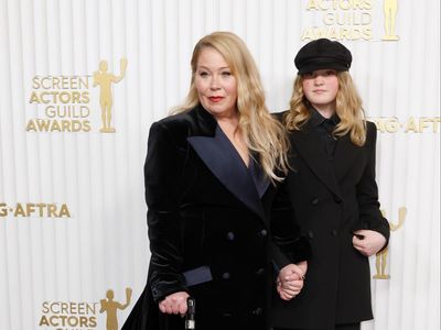Christina Applegate carries cane with ‘FU MS’ sticker as she is accompanied by daughter at SAG Awards