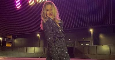 Amanda Holden unleashes her inner ABBA as she rocks sparkly suit for concert