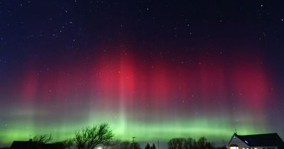 Northern lights see red and green pillars 'dancing across the sky' in stunning display over Ireland