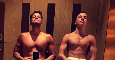 Peter and Junior Andre show off matching six-packs on singer's 50th birthday