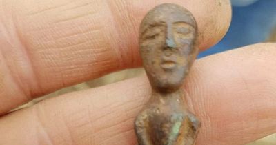 Nude figure with a huge hinged phallus found in field to be sold at auction