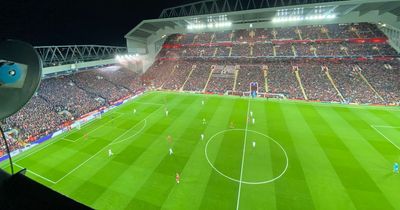 Man surrounded by police after scaling Anfield roof during Champions League clash