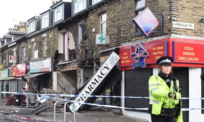 Police car collision causes major damage to row of shops in Bradford