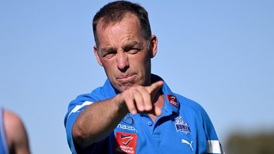 Alastair Clarkson defends temper after clash with reporter at North Melbourne Kangaroos AFL training