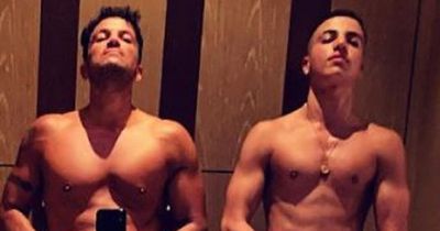 Peter Andre fans say "no way" as look-alike son shares topless photo of their matching six packs as he turns 50